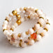 Warm peach and cream bracelet set handmade from gemstone and shell beads