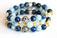 Handmade beaded bracelet with sodalite, aquamarine, and amber stones