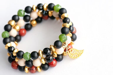 Gemstone bracelet set with canadian jade red jasper black agates and beige fossil beads
