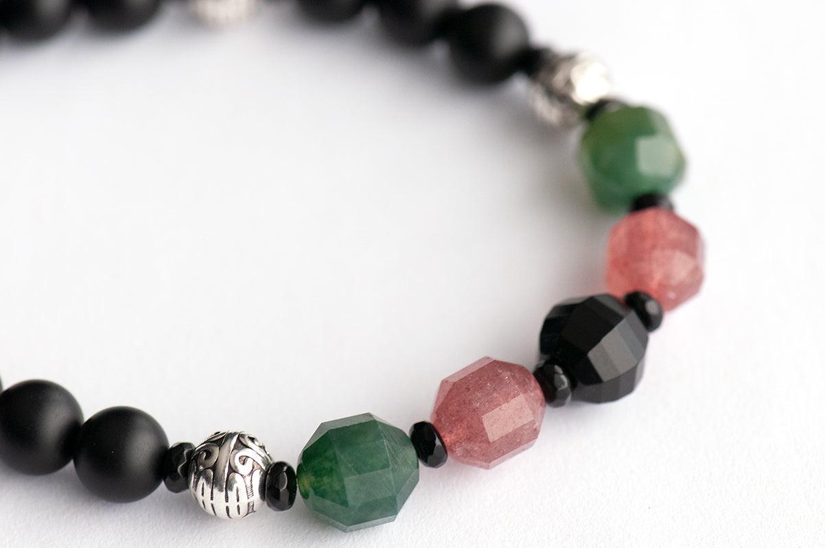 Detail of faceted Strawberry Quartz, Moss Agate, and Onyx