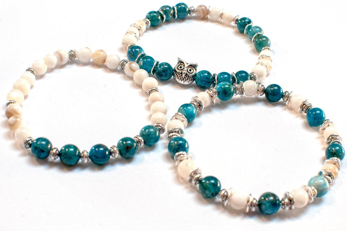 Apatite gemstone bracelet with freshwater shell beads. 
