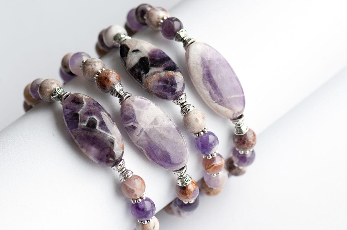 Unique dog teeth amethyst bracelets handmade in canada with February birthstone