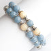 Handmade bracelet pair with Angelite, Quartz and yellow opal gemstones. 