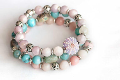 Walk on the Beach bracelet stack with lilac Kunzite, pink opals, and terra agate